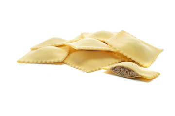 Classic uncooked ravioli pasta with meat topping isolated on a white background