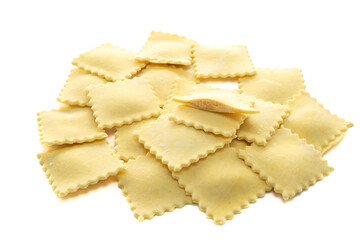 Classic uncooked ravioli pasta with salmon topping isolated on a white background