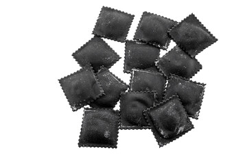 Fresh black ravioli with squid ink and salmon isolated on a white background