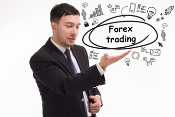 Business, technology, internet and network concept. Young businessman thinks over the steps for successful growth: Forex trading