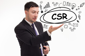 Business, technology, internet and network concept. Young businessman thinks over the steps for successful growth: CSR