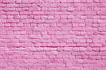 Fototapeta na wymiar Pink brick wall. Loft interior design. Pink paint of the facade. Architectural background.