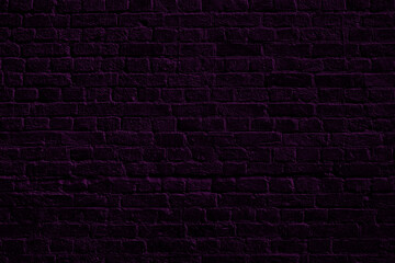Violet brick wall. Loft interior design. Violet paint of facade.  Architectural background.
