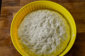 Raw focaccia dough close up texture. Traditional Italian Focaccia homemade flat bread focaccia.	