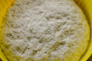 Raw focaccia dough close up texture. Traditional Italian Focaccia homemade flat bread focaccia.