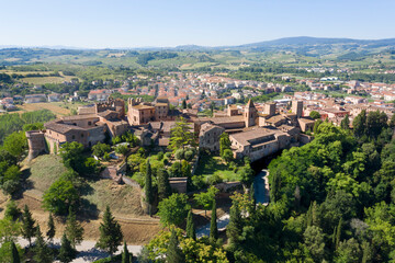 Fototapeta na wymiar aerial view of the medieval town of Certaldo with visible in the background the town of San Gimignano on the hills of tuscany