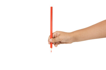 a child's hand draws with a red pencil on a white background isolated