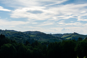 Fototapeta na wymiar Nice view over the hills of south Styria, Austria. A lot of farmland a vineyards