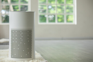 Air purifier in cozy white Living room for filter and cleaning dust PM2.5