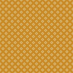 Vintage geometric seamless pattern. Vector abstract texture with small shapes, tiny dots. Yellow mustard color. Ethnic folk style ornament. Simple minimal retro background. Repeat design for wallpaper