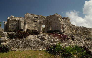 Fototapeta na wymiar Ancient civilization architecture and construction. Sacred mayan stone ruins in Tulum, Mexico.