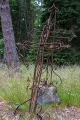 Beautifully grafted metal gross at The Island of Naissaar English military cemetery, Estonia