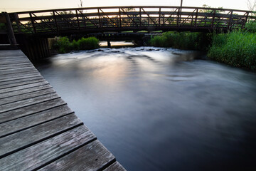 bridge over stream at portage creek bicentennial park in Michigan