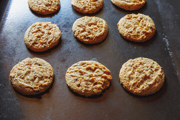 Traditional homemade cranberry biscuits on baking tray