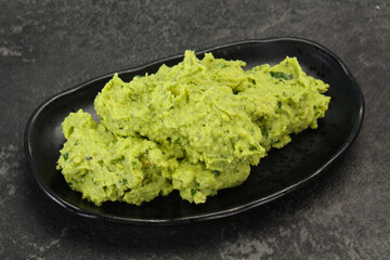 Avocado guacamole sauce with chili pepper