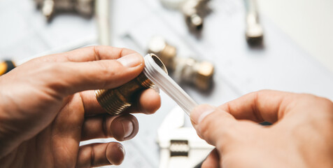 Obraz premium man hand tools on the construction papers