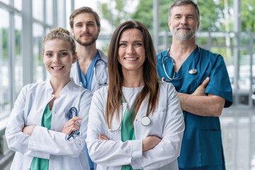 Group of medical staff smiling at the hospital.