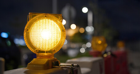 Yellow caution light at street