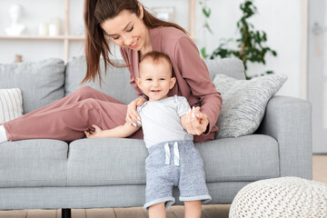 Adorable Toddler Baby Boy Having Fun With Mom At Home, Sincerely Laughing