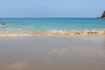 Fototapeta na wymiar Tropical beach with white sand and blue water