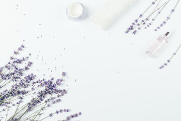 Flat lay frame lavender flowers with natural organic cosmetics