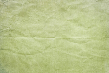 old wrinkled green paper texture or background