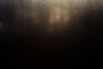 blurry window, dark gray background