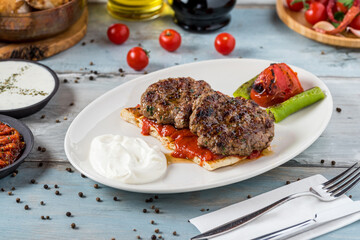 Turkish traditional kofte. Spicy meatballs Kebab or Kebap.