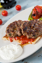 Turkish traditional kofte. Spicy meatballs Kebab or Kebap.