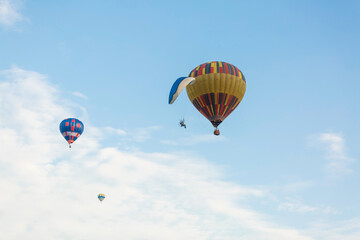 Fototapeta premium hot air balloon over blue sky. Composition of nature and blue sky background