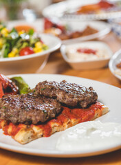 Turkish traditional kofte. Spicy meatballs Kebab or Kebap.