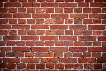 Red brick wall background. Old brick texture, close up
