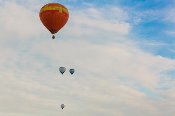 hot air balloon over blue sky. Composition of nature and blue sky background