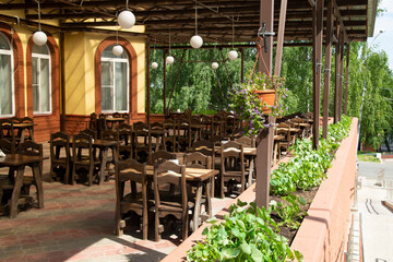 Summer cafe on the city street in the Park.