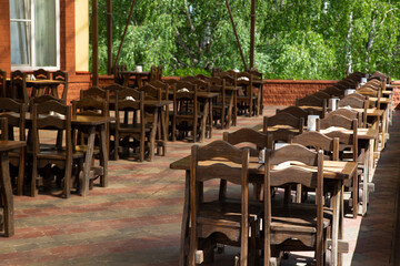 Summer cafe on the city street in the Park.