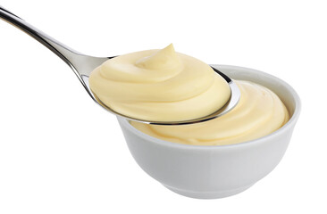 Mayonnaise in spoon isolated on white background