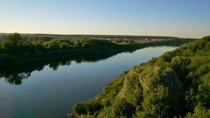 Fototapeta na wymiar View of the Don River and surrounding villages from the bridge in the Voronezh region