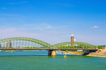 Naklejka premium The Hohenzollern Bridge or Hohenzollernbrucke across Rhine river