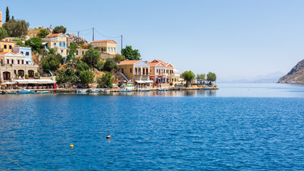 Obraz premium View of beautiful bay of Symi island, Dodecanese, Greece