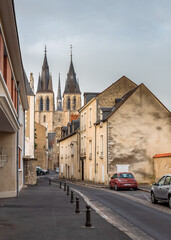 Obraz premium Blois, Loire Valley, France. Empty narrow street leading to the church in the old town.