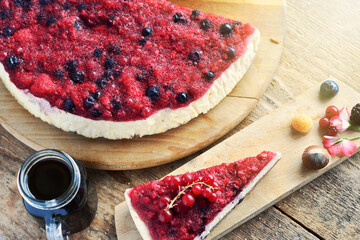 cheesecake, vanilla cream cake with berry jelly crust and aromatic coffee. breakfast sweets	