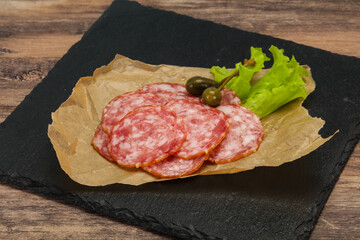 Spanish Salchichon sausage with salad