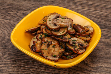 Roasted champignon with herbs and spices