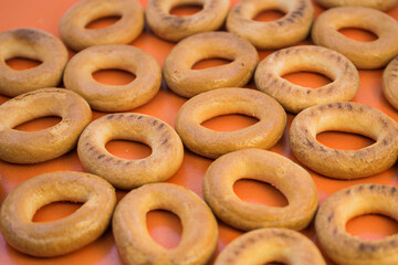 background of round yellow barracks on an orange surface