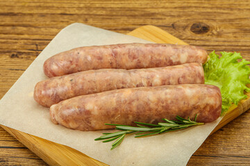 Raw pork meat sausages for grill