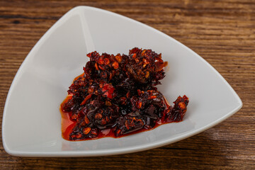 Fried chili pepper sauce with oil