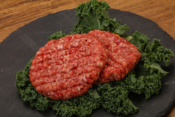 Raw beef burger cutlet for cooking