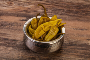 Marinated spicy and hot green pepper