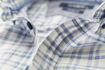 Close up of Men's checkered shirt.