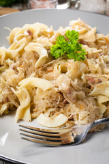 Pasta with sauerkraut and bacon.